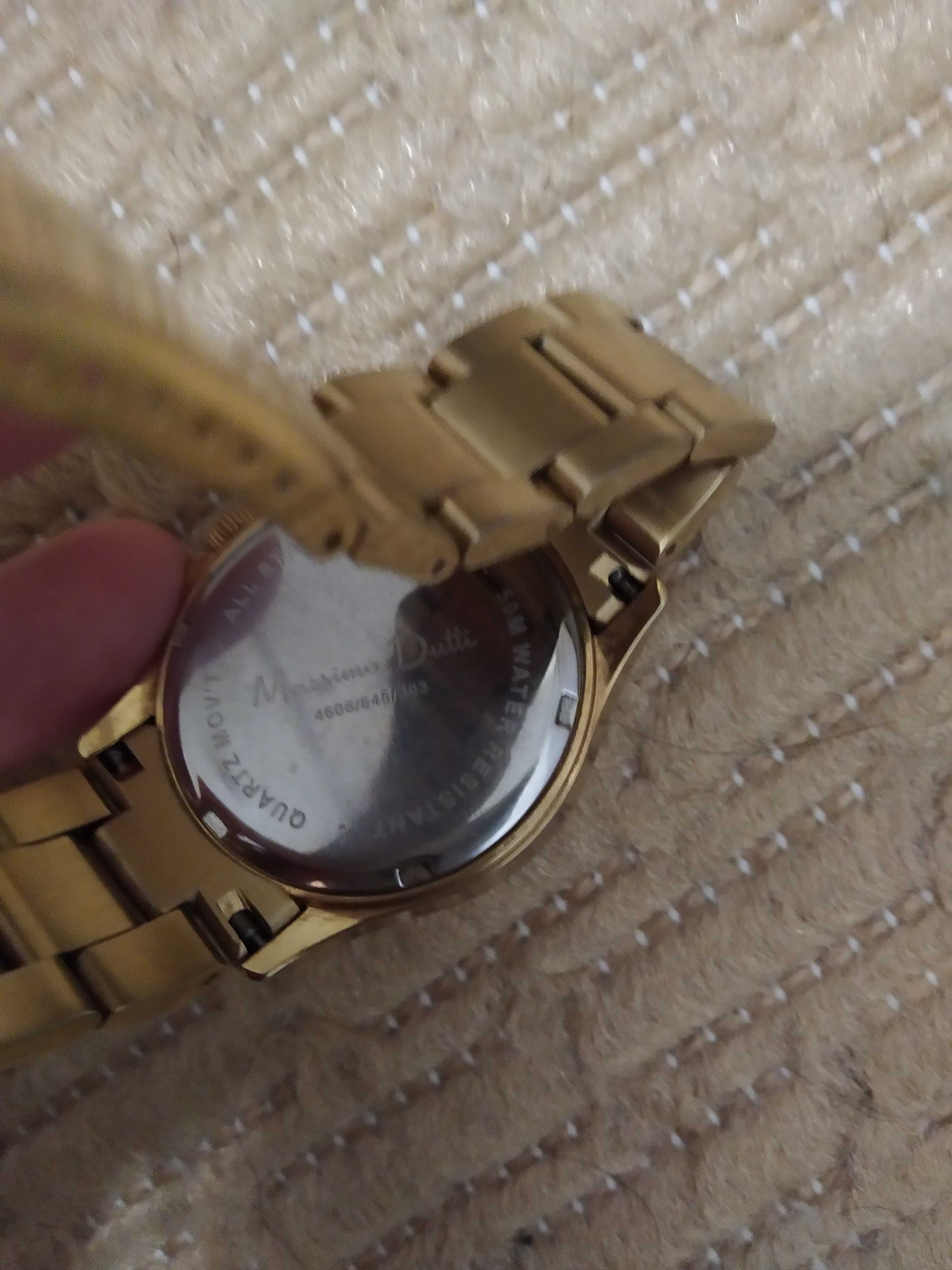 Relógio dourado maximo Dutti e Relógio Swatch senhora pequeno