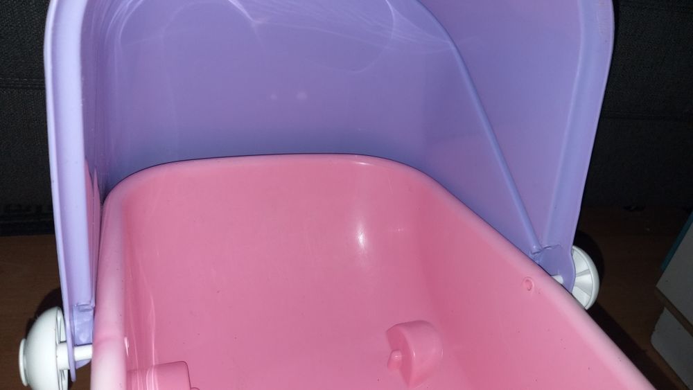 Детская игрушечная коляска