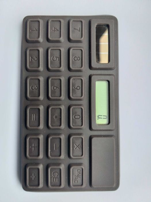 Calculadora / Máquina de calcular SOLAR em forma de chocolate Nova