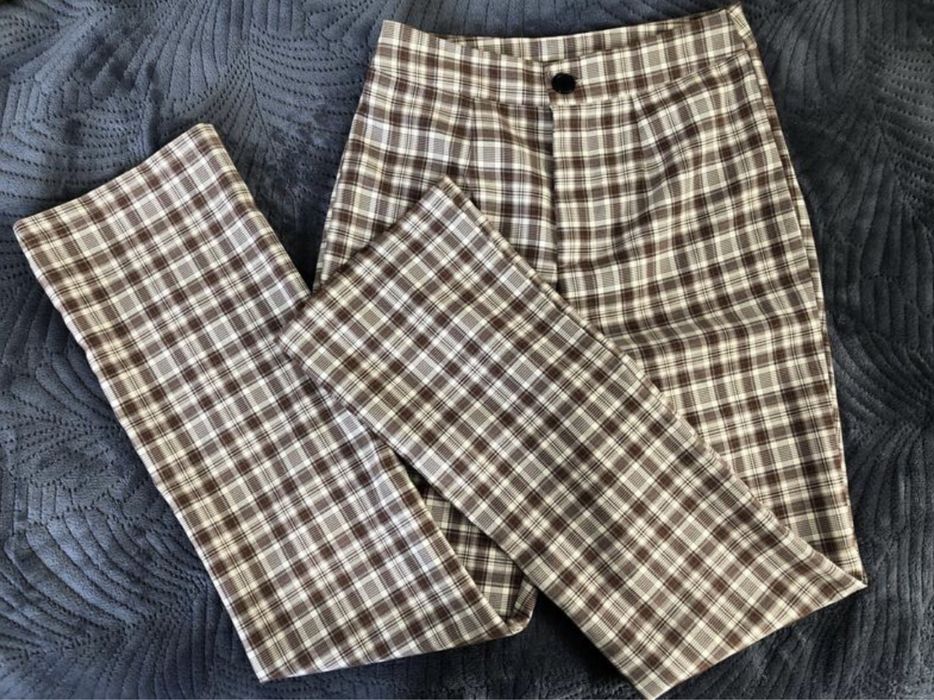 Штани в клітинку кльош