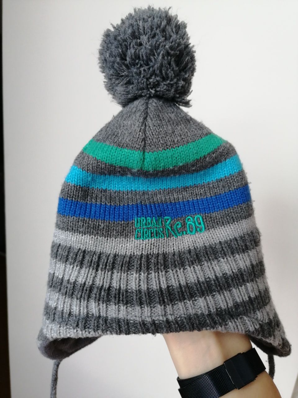 Czapka zimowa Reserved r. 9-12 m-cy Szara z pomponem na polarze