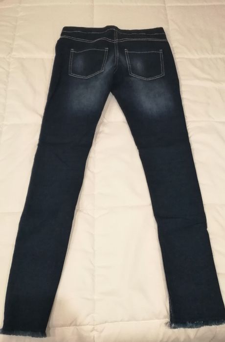 Calças skinny de criança