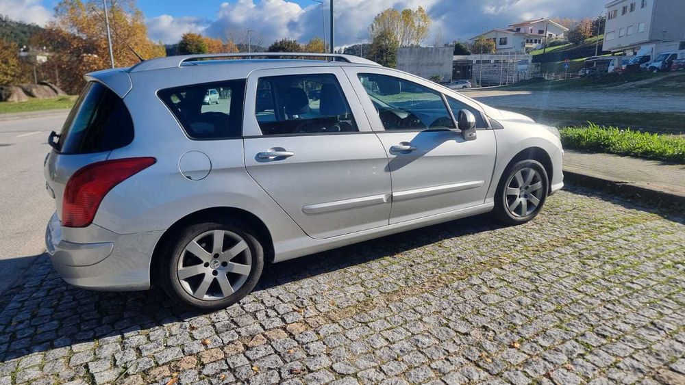 Peugeot 308 SW 2010 com teto panorâmico