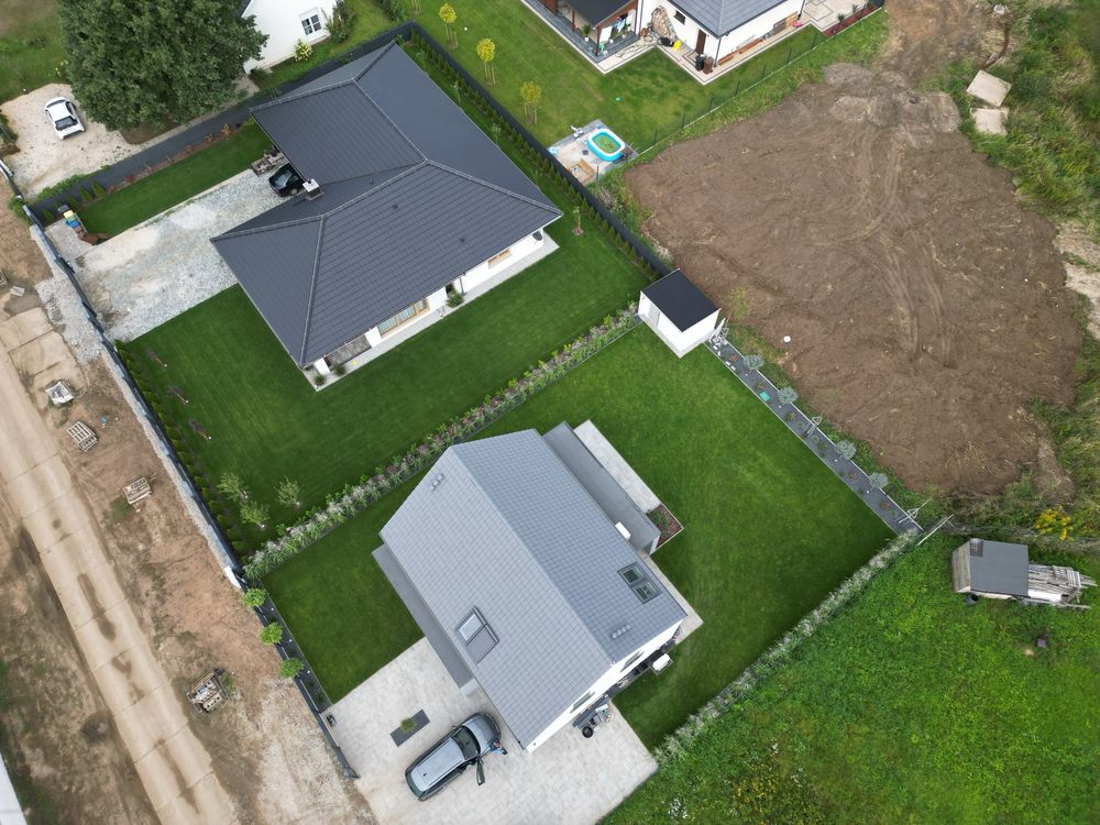 Ogrody Prace ziemne Systemy nawadniające Trawniki Tarasy Ogrodzenia