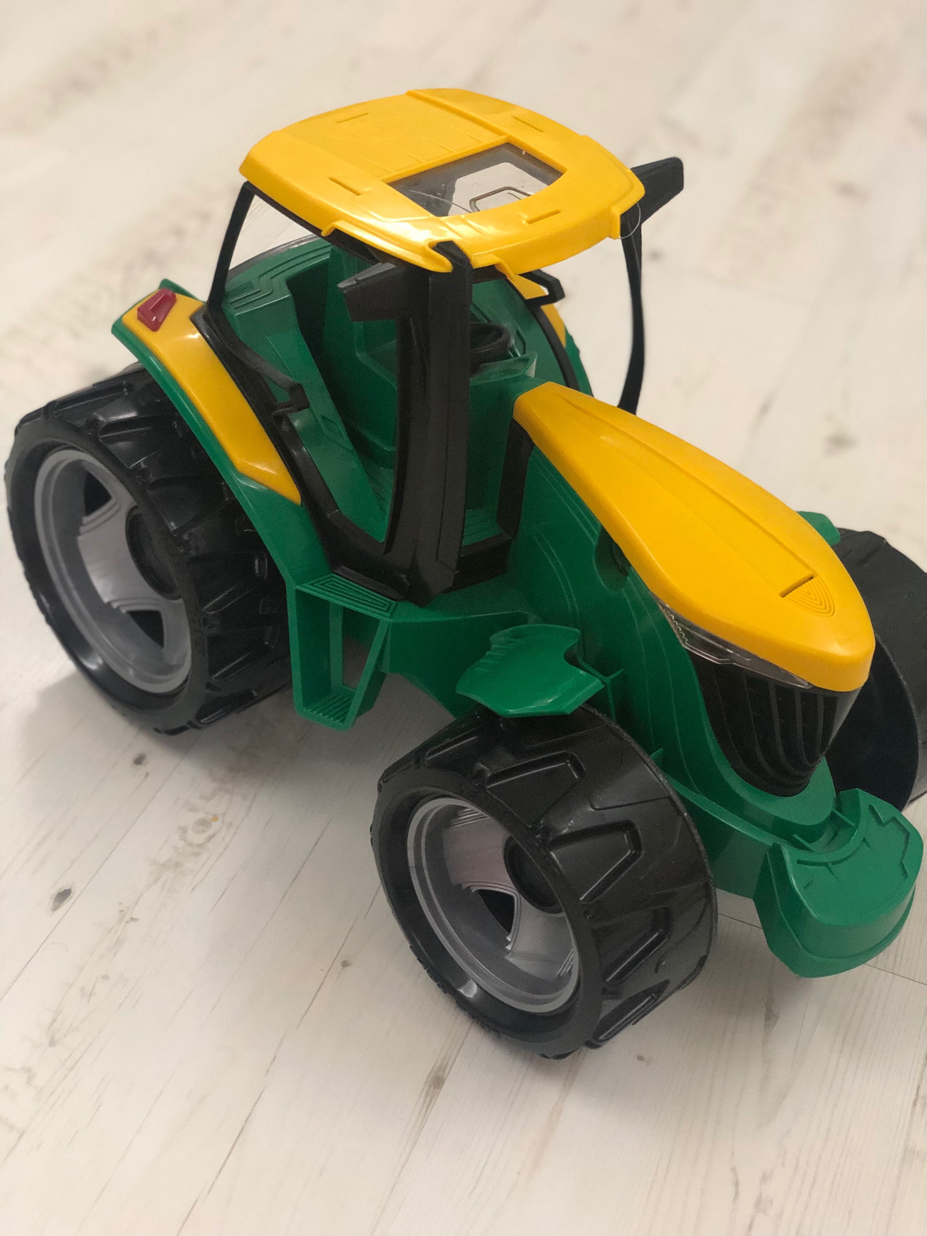 Дитячий іграшка трактор