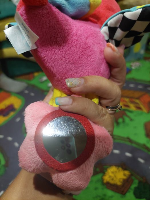 Іграшка на коляску