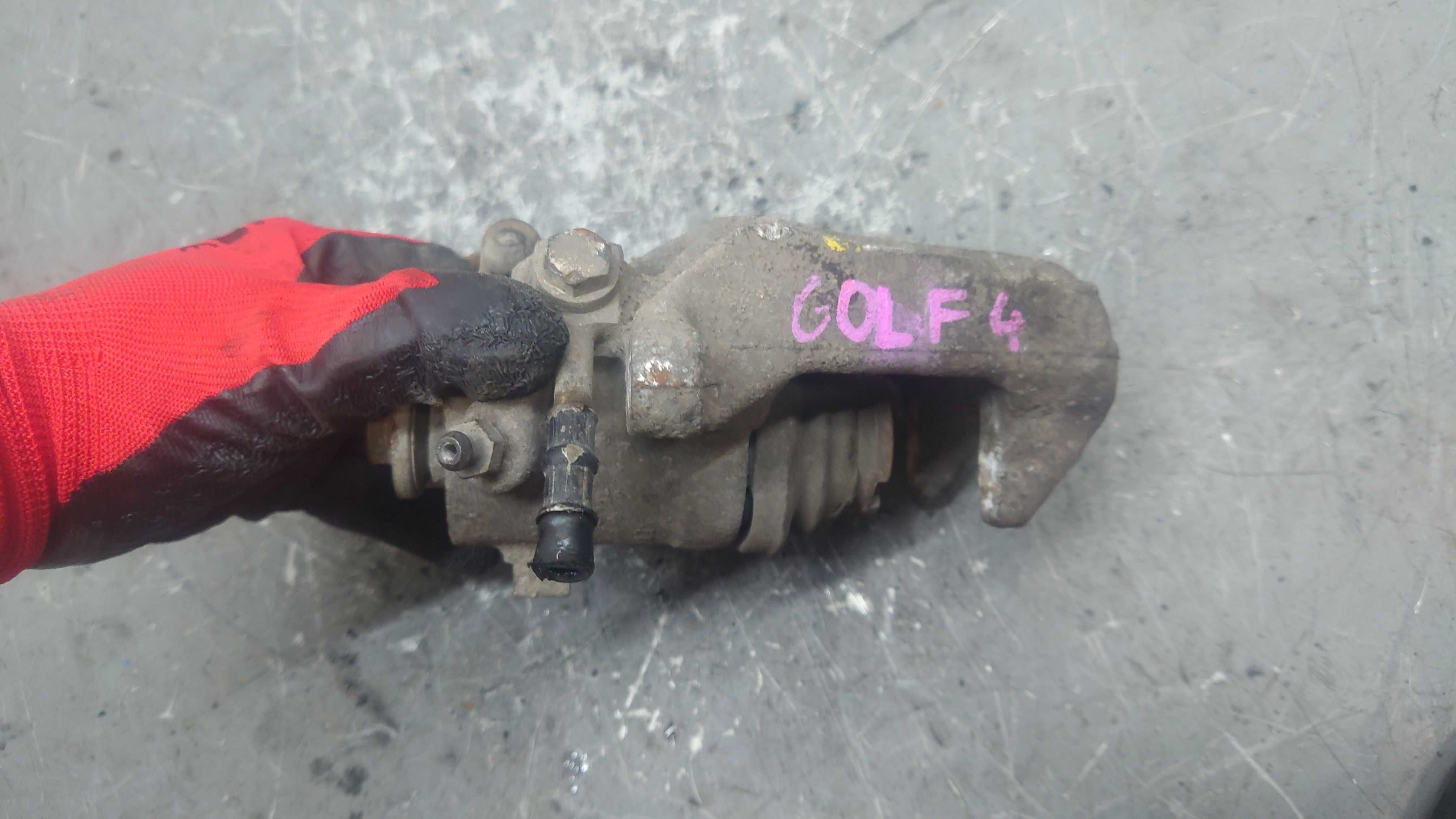VW Volkswagen Golf IV 4 Bora New Beetle Zacisk Lewy Tył Tylny
