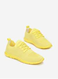 Жовті жіночі кросівки