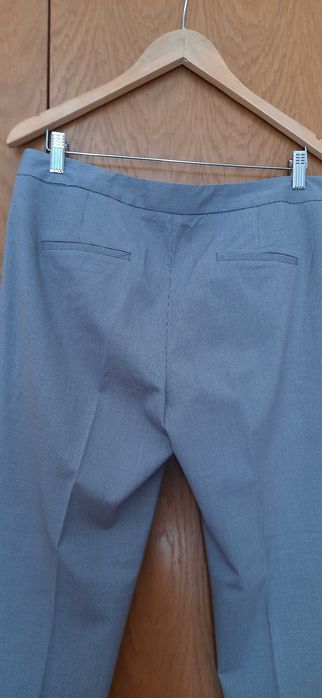 Calças modelo de fato em tecido pied de poule da Zara