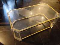 mesa de apoio em vidro e acrílico e estrutura em latão