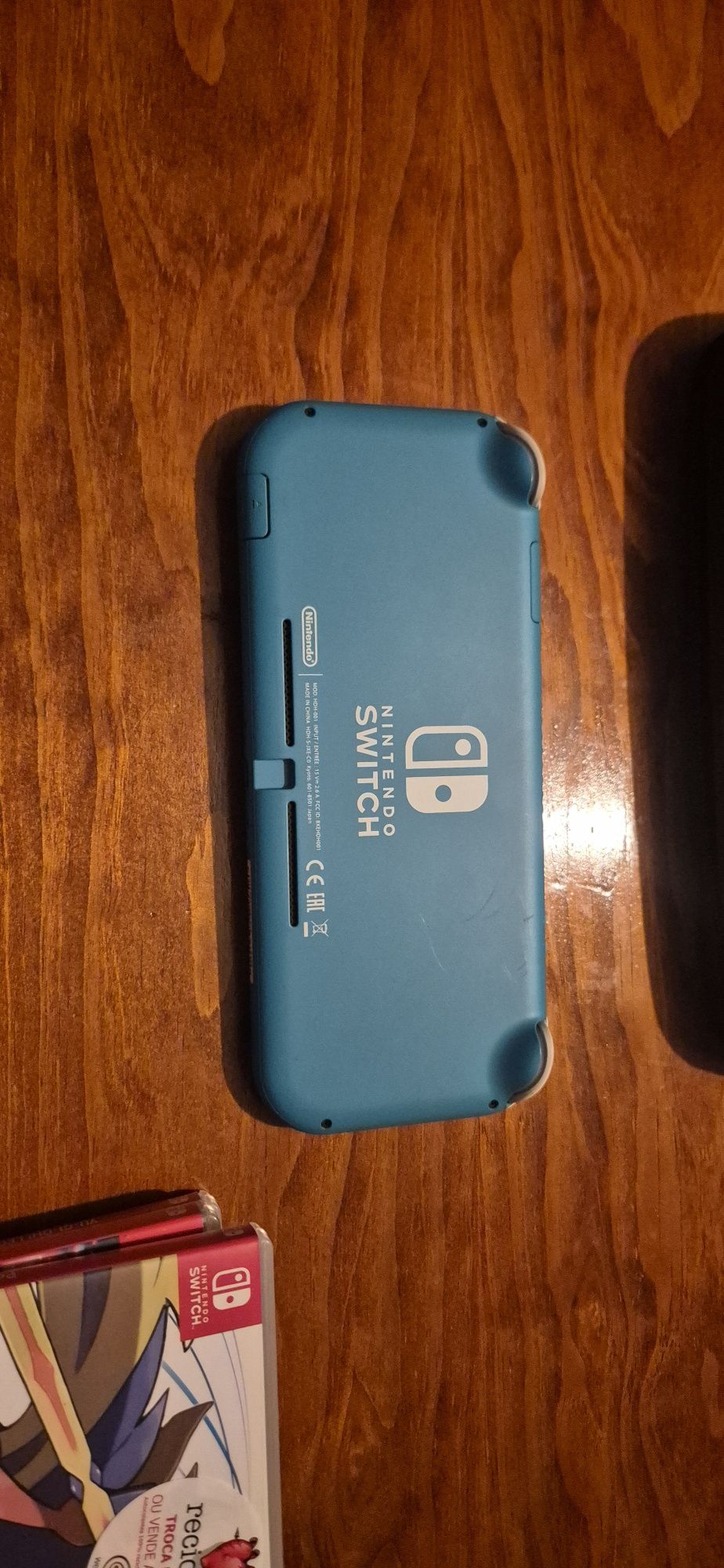Nintendo switch lite + 3 Jogos