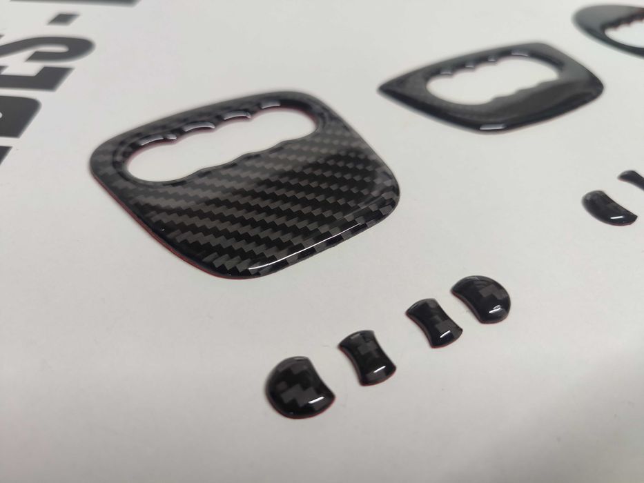 Símbolos do volante tipo carbono