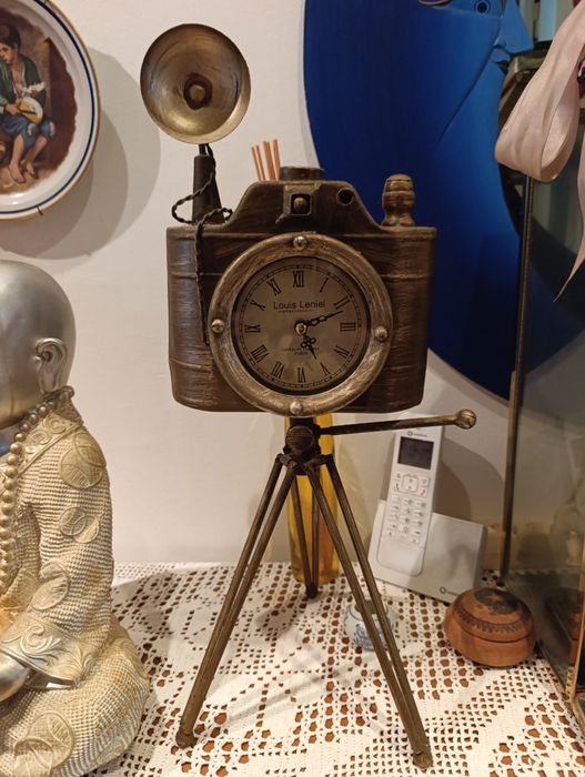 Máquina fotográfica relogio