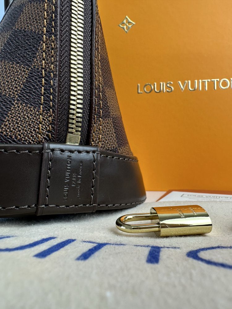 Torebka damska kuferek Louis Vuitton Alma Tote Skóra luks LV