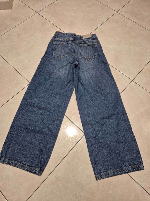 Reserved Spodnie jeansowe dziewczęce r. 146 buggy