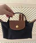 Longchamp mini torba czarna na rzepie, na pasku i na ręku