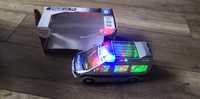 Auto Policja na baterie świeci jaździ mówi po polsku
