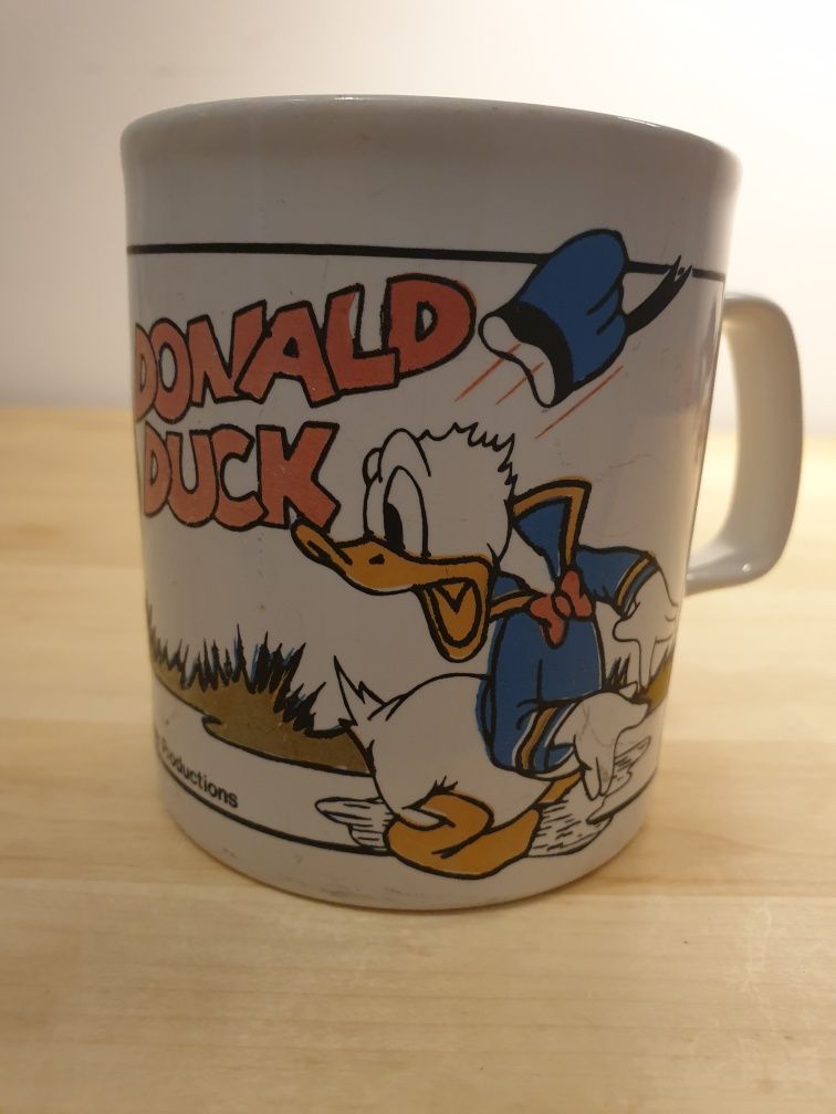Donald Duck caneca vintage amor  é Pooh peluche warner Bros papa legua