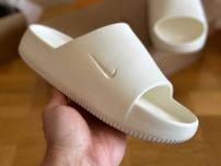 Шльопанці Nike Calm Slide	тапочки FD4116-100
