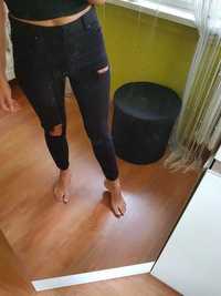 Czarne spodnie  jeansy rurki z dziurami Clockhouse M