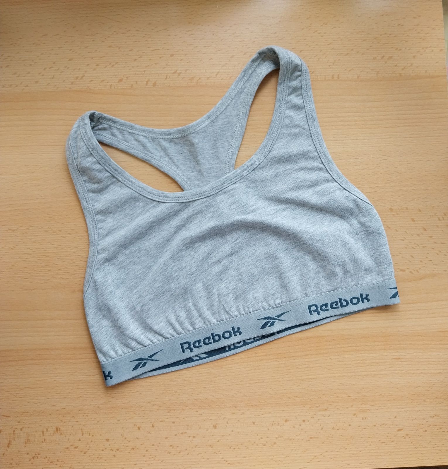 Szary bawełniany top sportowy crop top Reebok rozmiar M/38