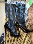 Botas de cano alto em pele