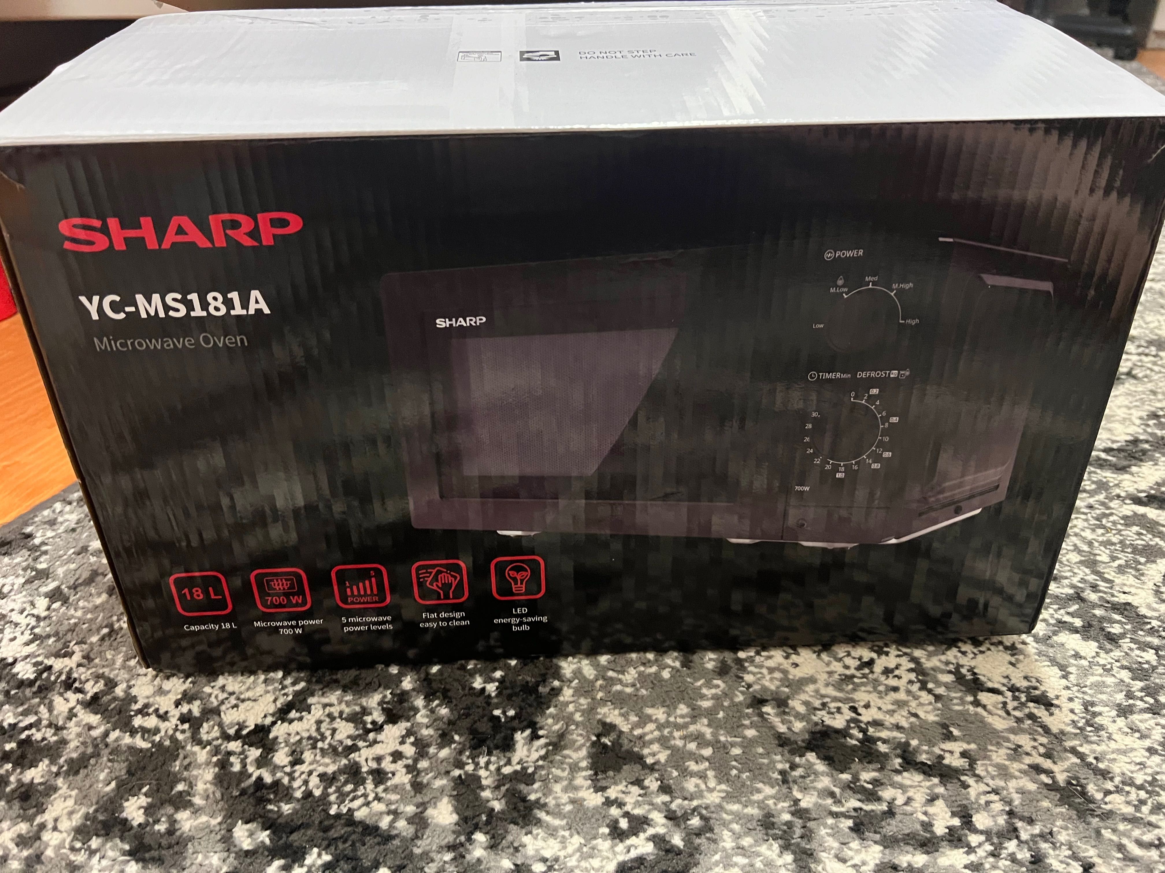 Мікрохвильова піч Sharp