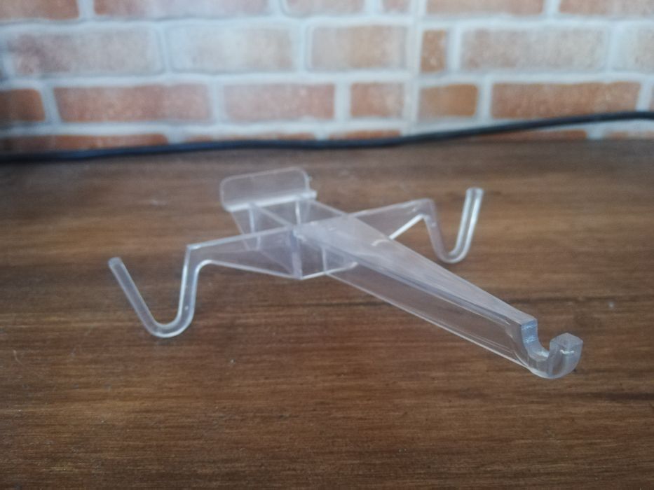 Suporte plástico para óculos