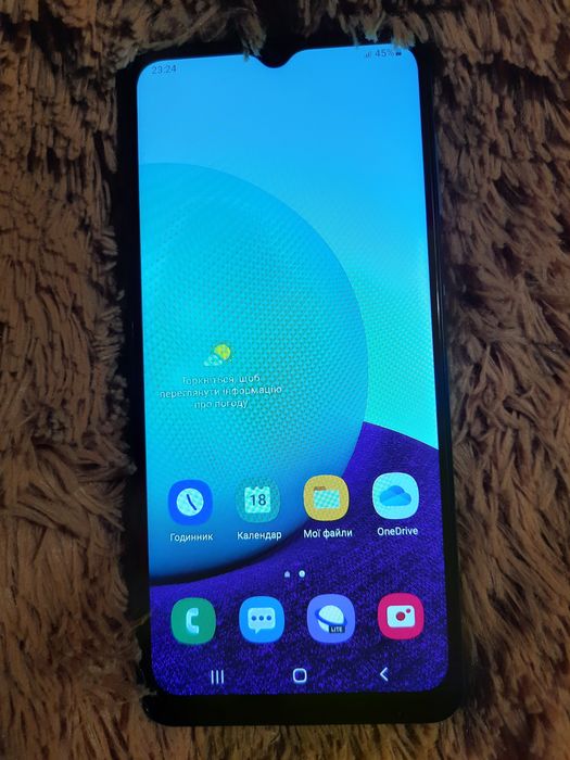 Продам мобильный телефон  Samsung A02 память 2×32гб в отличном состоян
