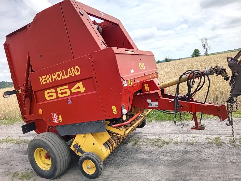 New holland 654 na części  podbieracz walce komputer