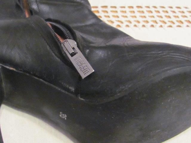 Botas em pele genuina