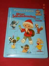 Książka z puzzlami Piaskowy Dziadek (jęz. niemiecki)
