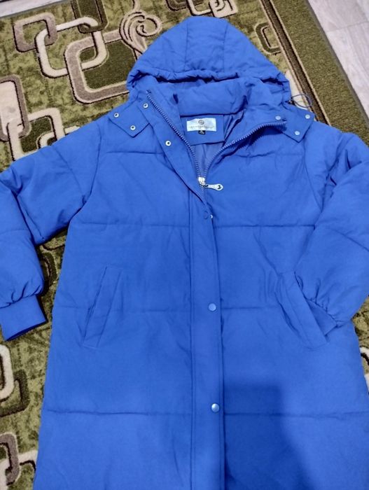 Довгий  пуховик.