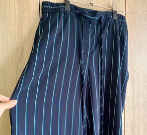 Eleganckie lejące spodnie w paski XS