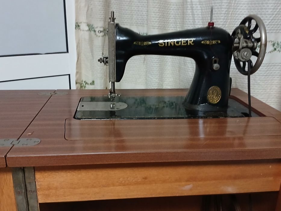 Máquina de costura singer