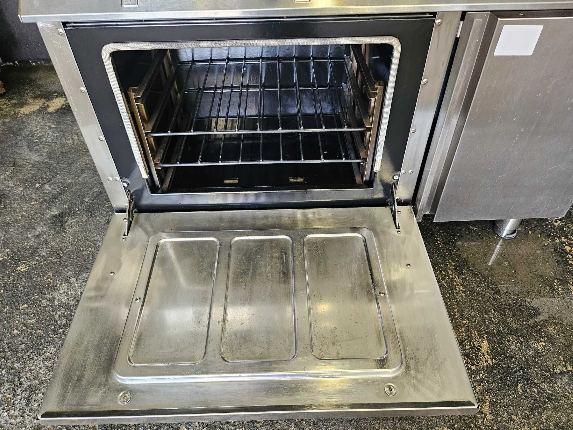 Fogão com 3 queimadores e forno