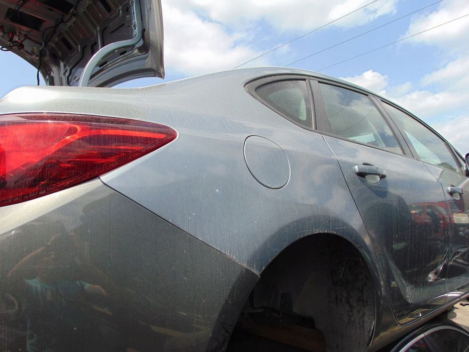 ĆWIARTKA BŁOTNIK PRAWY TYŁ OPEL ASTRA J 4 IV SEDAN