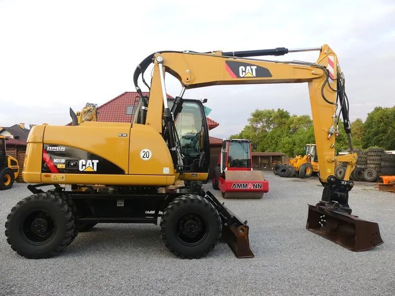Caterpillar CAT M313D Z Niemiec / POWERTILT / Bardzo ładny stan /  BEZ DPF / 315 316 / 312 314 / 900 914 / 918 pw148 /