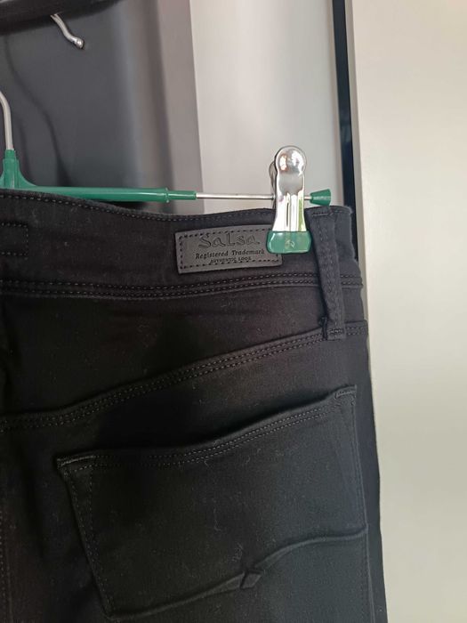 Calças de ganga como novas