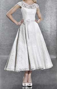 Przepiękna suknia ślubna kremowa roz. M
