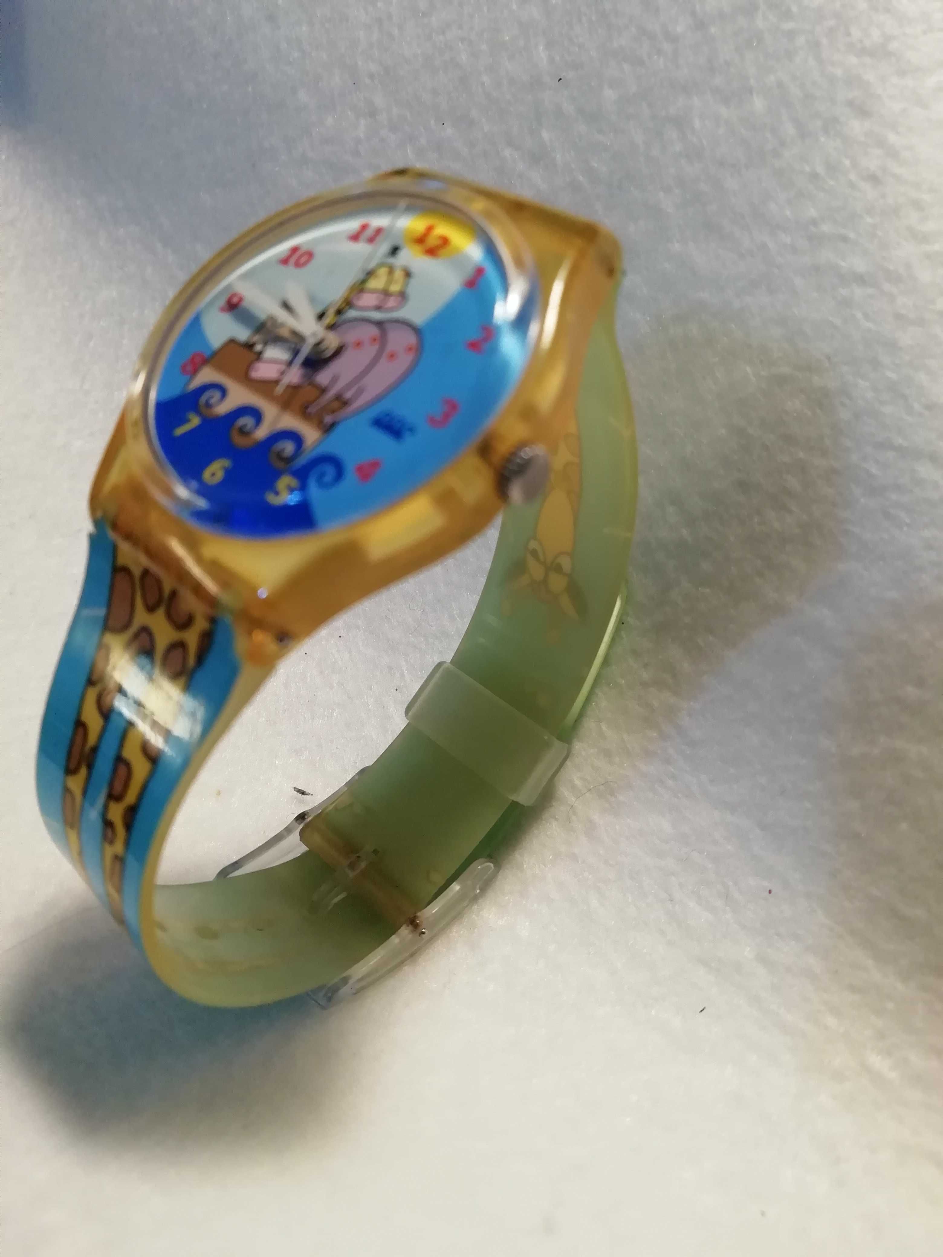 Relógio swatch	Fundo arca de Noé e bracelete com girafa. Como Novo !!