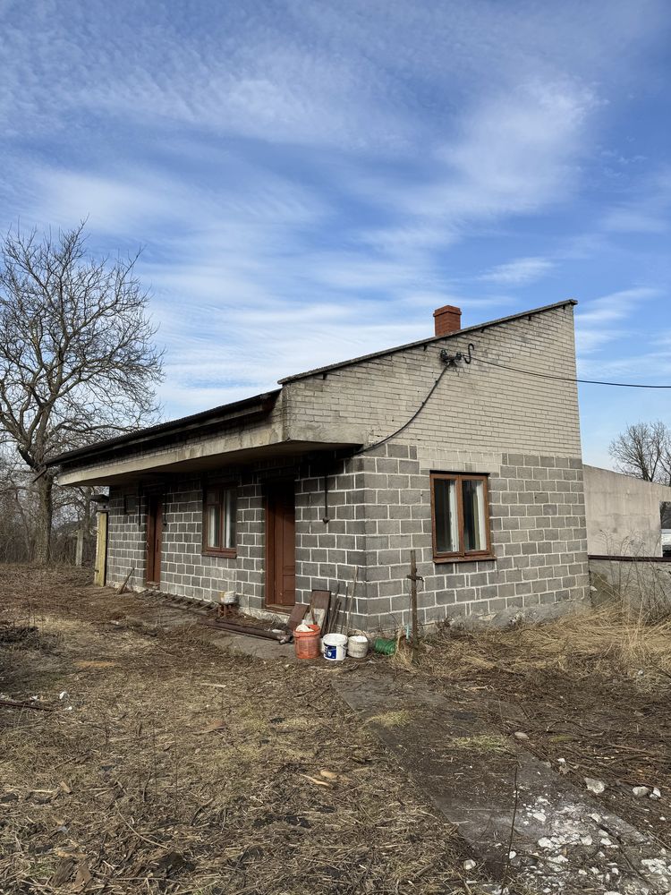 Dom z dzialka 15a