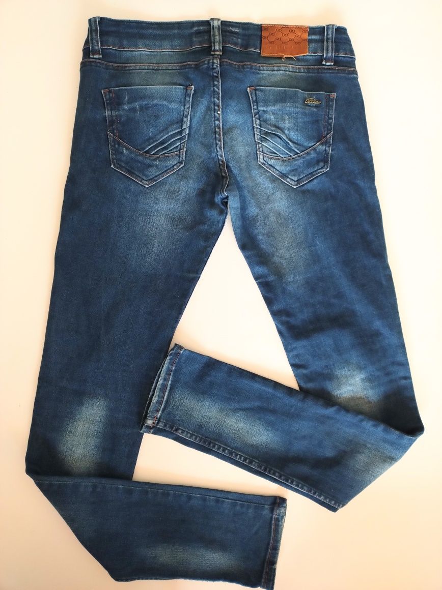 Spodnie jeans Gucci 40