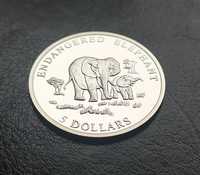 Moneta srebrna ze słoniami z kategorii gatunek zagrożony