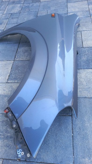 Opel Astra h 3  blotnik przedni prawy szary z155