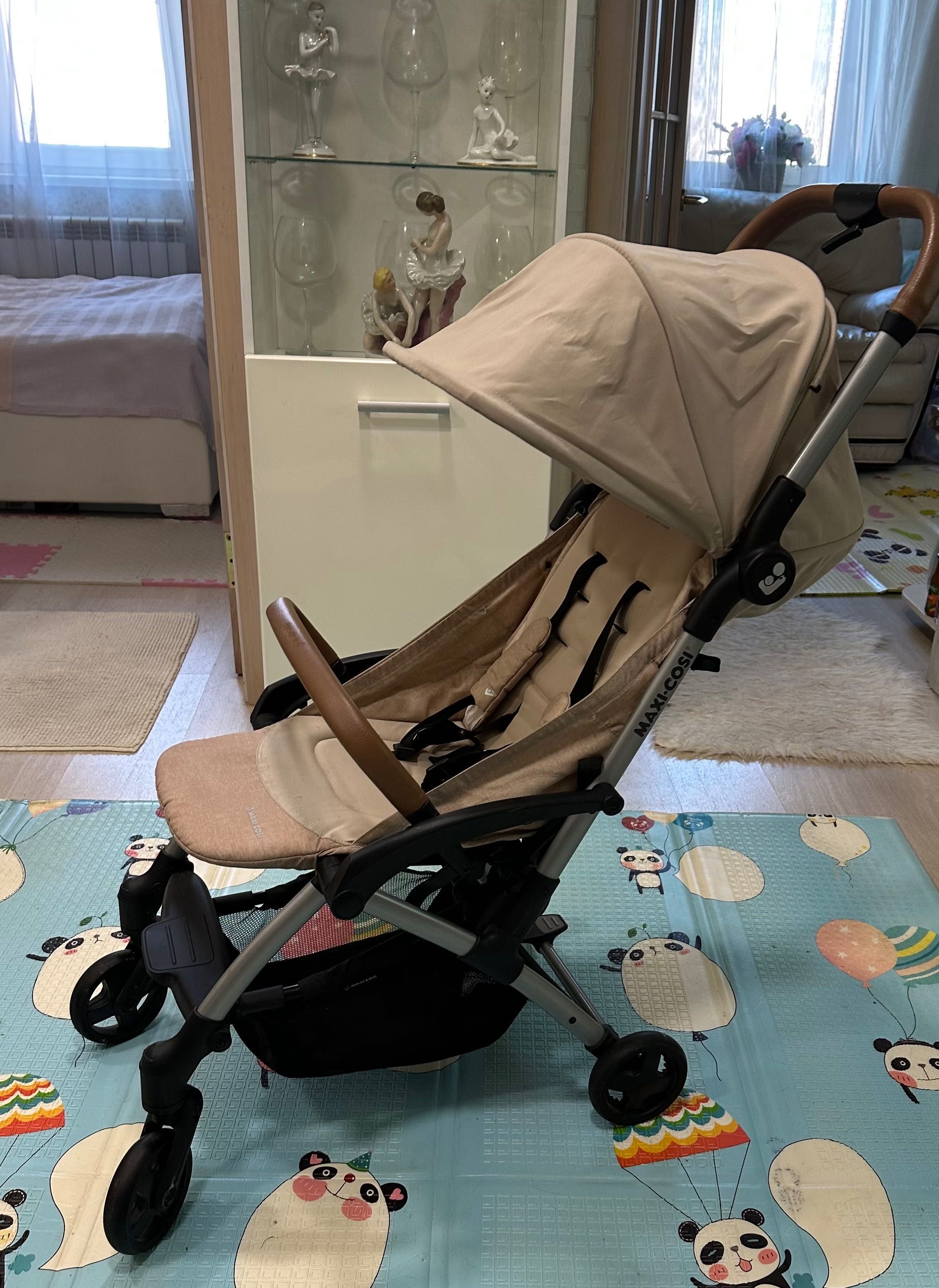 Детская прогулочная компактная коляска maxi cosi laika