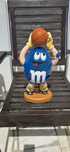 Dispensador M & Ms em boneco com depósito