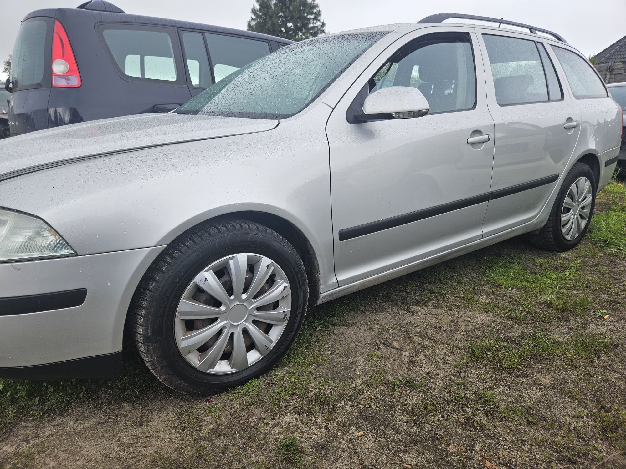Skoda Octavia 2  maska lampa blotnik drzwi klapa koła 9102