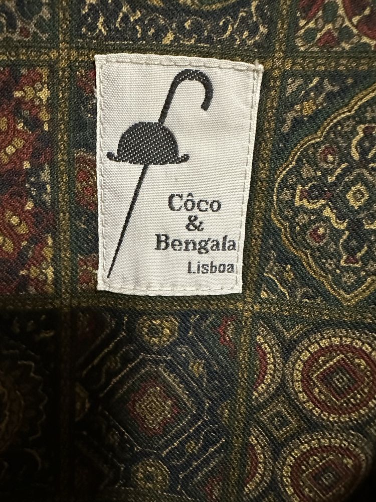 Parca bege coco e bengala