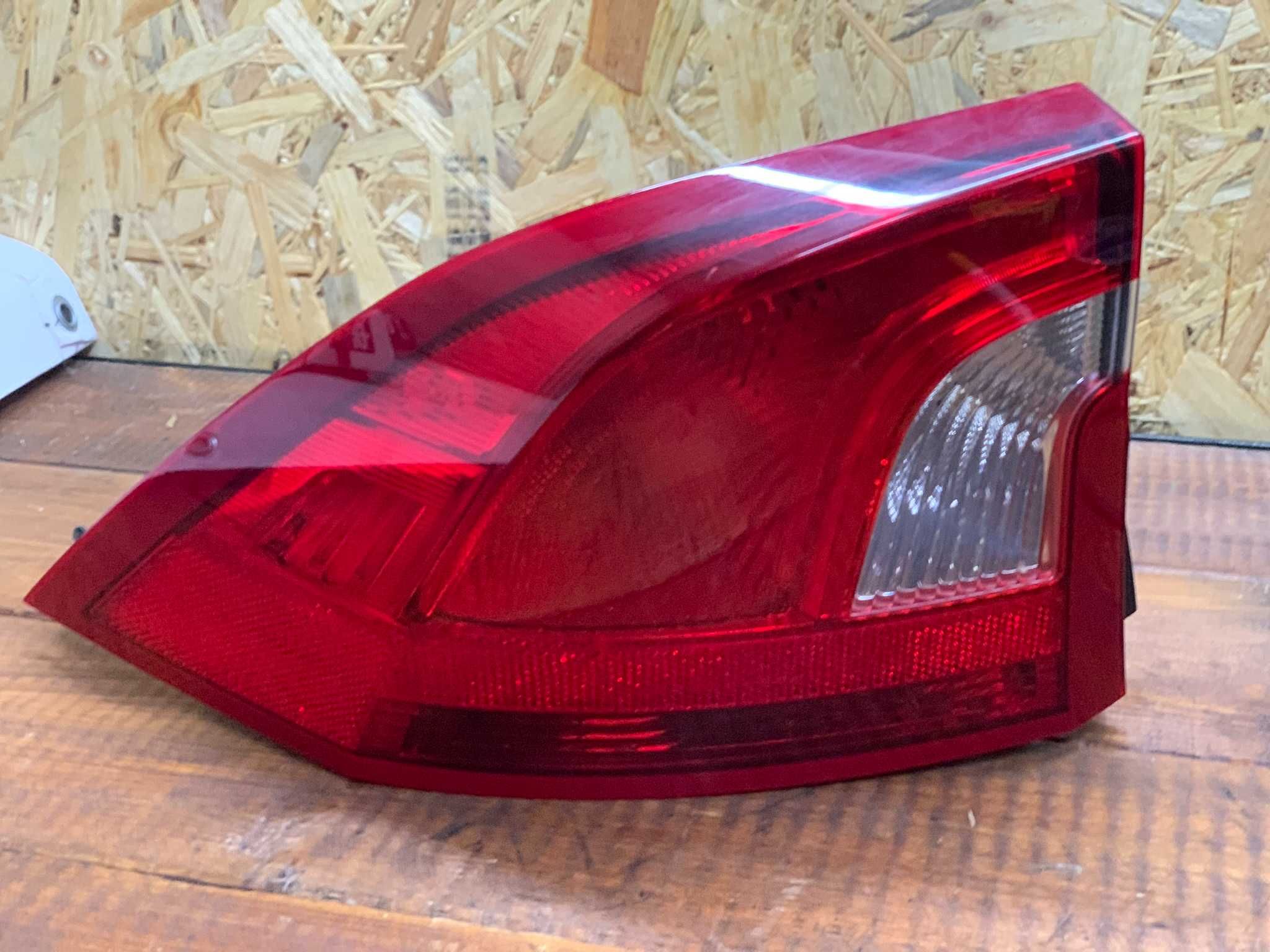 Lampa oryginalna lewy tył Volvo S60 II